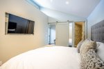 Top Floor Master Bedroom with King Bed. Features en-suite Bathroom, TV & Cabinet